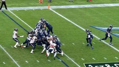 Derrick Henry powering through contact during his 2020 season with the Tennessee Titans, the campaign that produced 2,027 rushing yards and fifth place on the NFL’s all-time single-season list