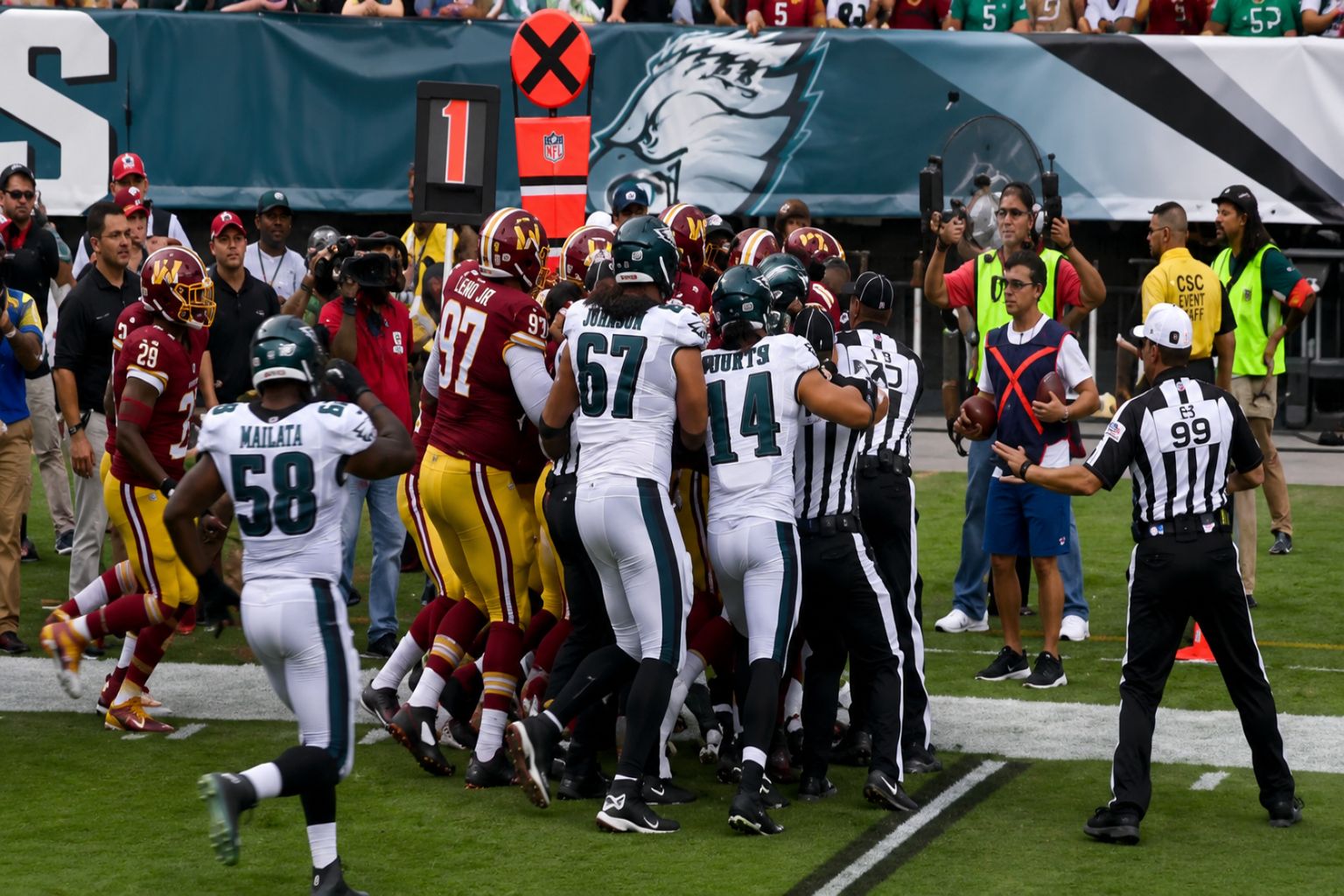 Jason Peters moves in on Chris Baker during a fourth-quarter scuffle after an illegal hit on Eagles quarterback Nick Foles in the September 21, 2014 game.