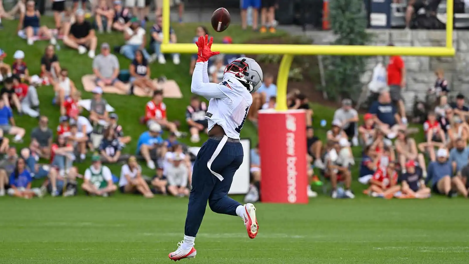 Jul 28, 2026; Foxborough, MA, USA; New England Patriots wide receiver A.J. Brown (1) makes a catch during training camp at Gillette Stadium. Mandatory Credit: E…