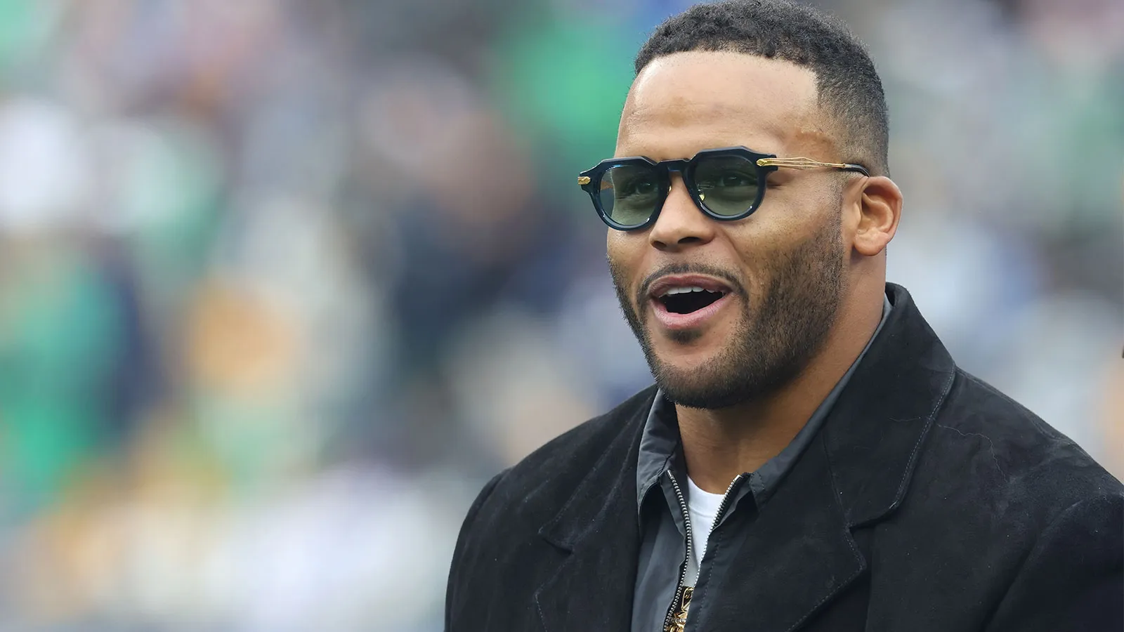 Nov 15, 2025; Pittsburgh, Pennsylvania, USA; Pittsburgh Panthers former defensive end Aaron Donald reacts as his jersey is retired in a ceremony during half-tim…