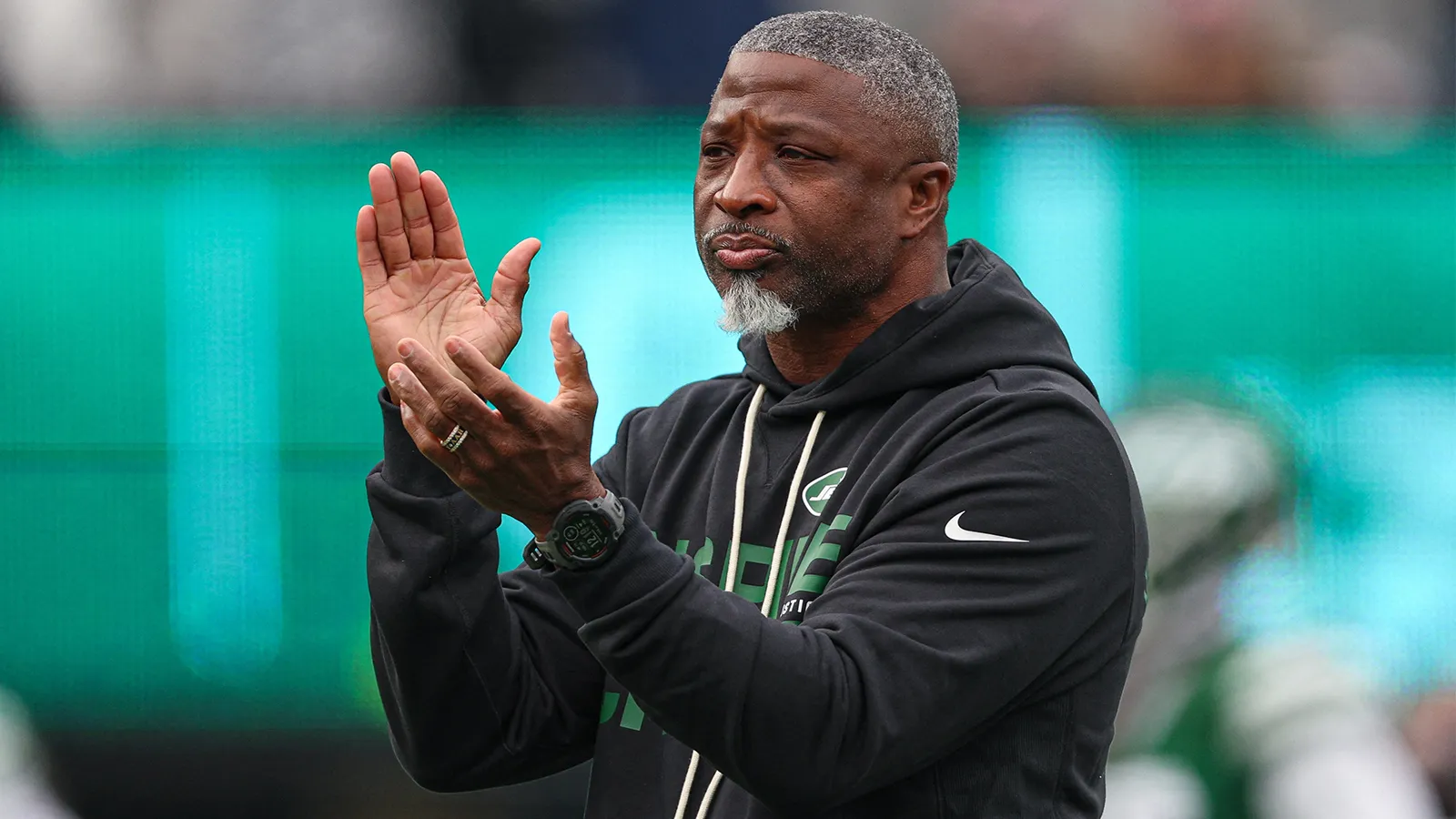 Dec 28, 2025; East Rutherford, New Jersey, USA; New York Jets head coach Aaron Glenn on the field before the game against the New England Patriots at MetLife St…