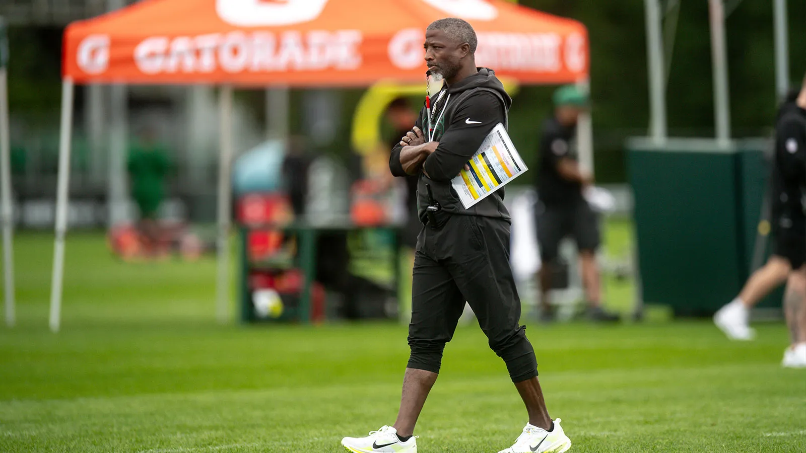 Jul 30, 2026; Florham Park, NJ, USA; New York Jets head coach Aaron Glenn looks on during training camp at Atlantic Health Jets Training Center. Mandatory Credi…