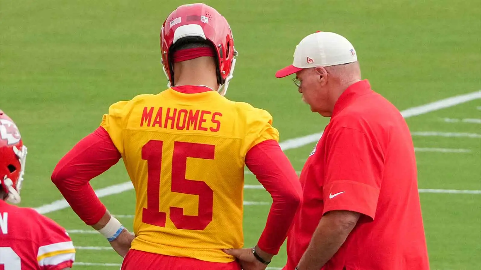 Jul 29, 2026; St. Joseph, MO, USA; Kansas City Chiefs quarterback Patrick Mahomes (15) talks with head coach Andy Reid during training camp at Missouri Western…