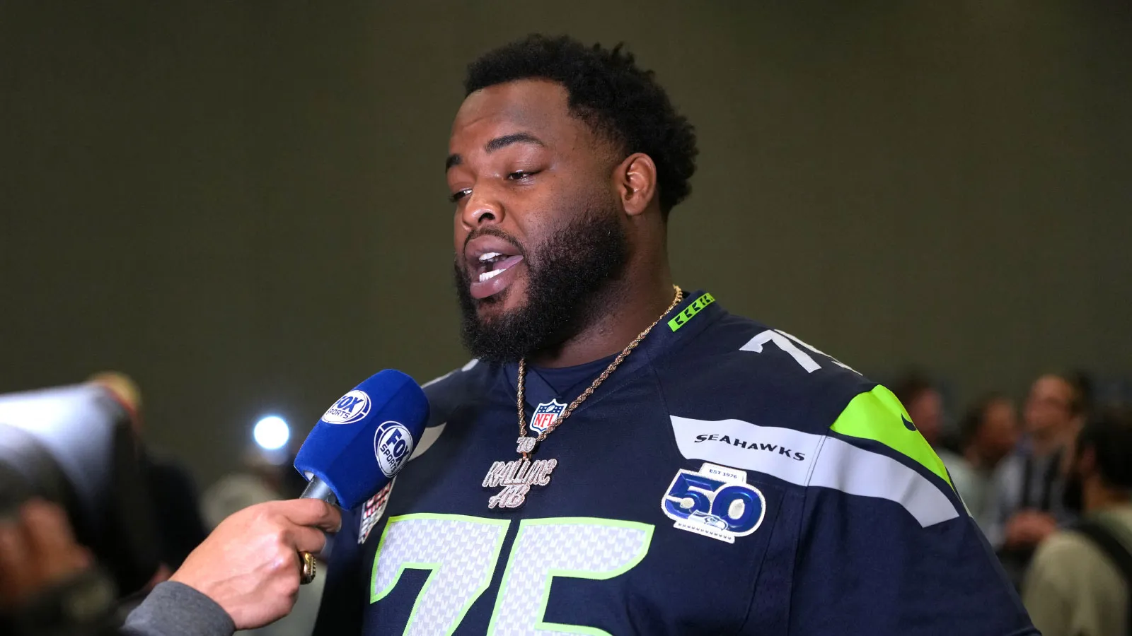 Feb 5, 2026; San Jose, CA, USA; Seattle Seahawks guard Anthony Bradford (75) talks to media members at the San Jose Marriott. Mandatory Credit: Darren Yamashita…