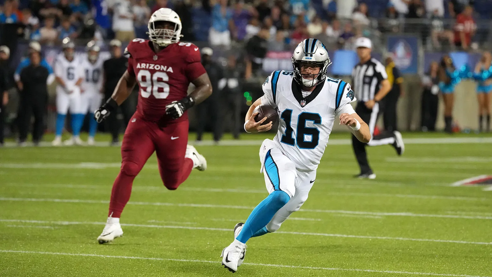 Aug 6, 2026; Canton, Ohio, USA; Carolina Panthers quarterback Haynes King (16) carries the ball against the Arizona Cardinals at Tom Benson Hall of Fame Stadium…