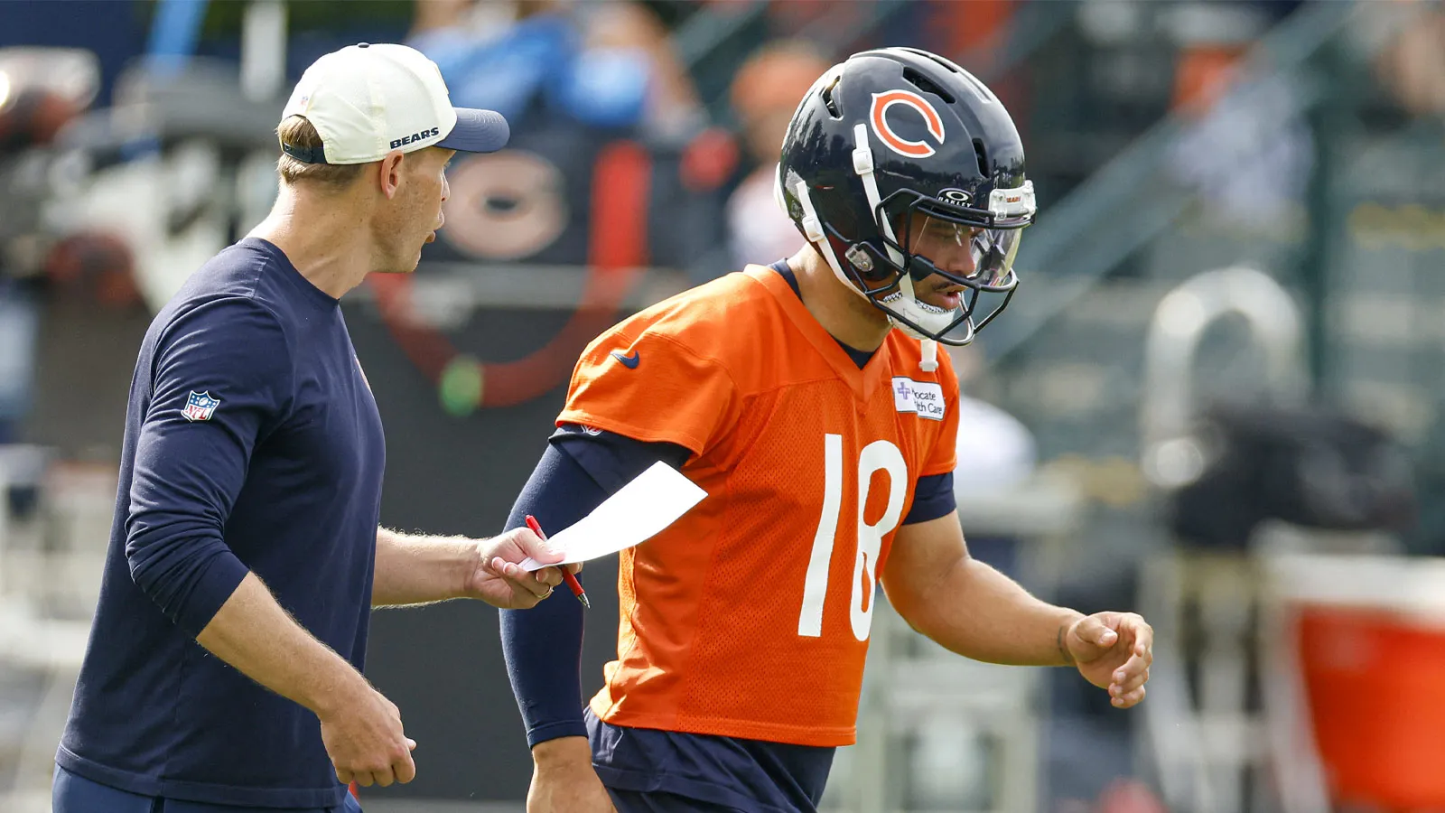 Jul 31, 2026; Lake Forest, IL, USA; Chicago Bears head coach Ben Johnson talks to quarterback Caleb Williams (18) during Training Camp at Halas Hall. Mandatory…