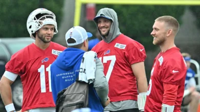 Jul 29, 2026; Rochester, NY, USA; Buffalo Bills Josh Allen (17) talks with fellow quarterbacks Kyle Allen (11) and Shane Buechele (6) during training camp at St…