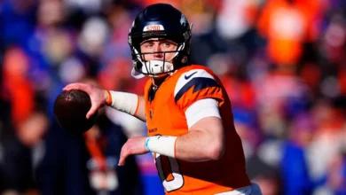 Jan 17, 2026; Denver, CO, USA; Denver Broncos quarterback Bo Nix (10) warms up before an AFC Divisional Round playoff game against the Buffalo Bills at Empower…