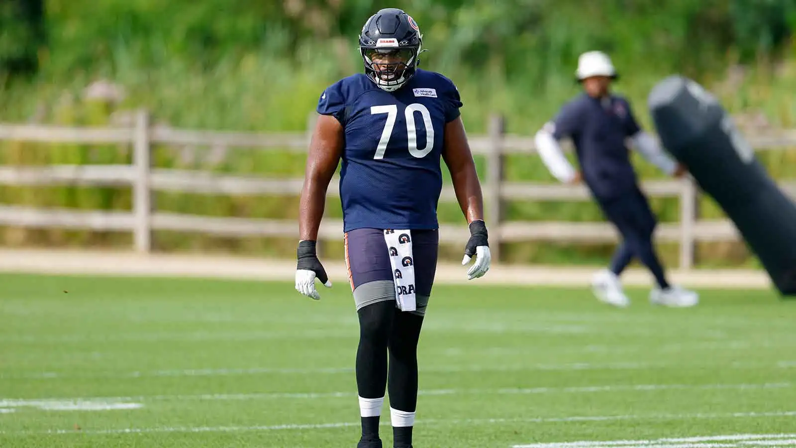 Jul 31, 2026; Lake Forest, IL, USA; Chicago Bears offensive tackle Braxton Jones (70) walks on the field during Training Camp at Halas Hall. Mandatory Credit: K…