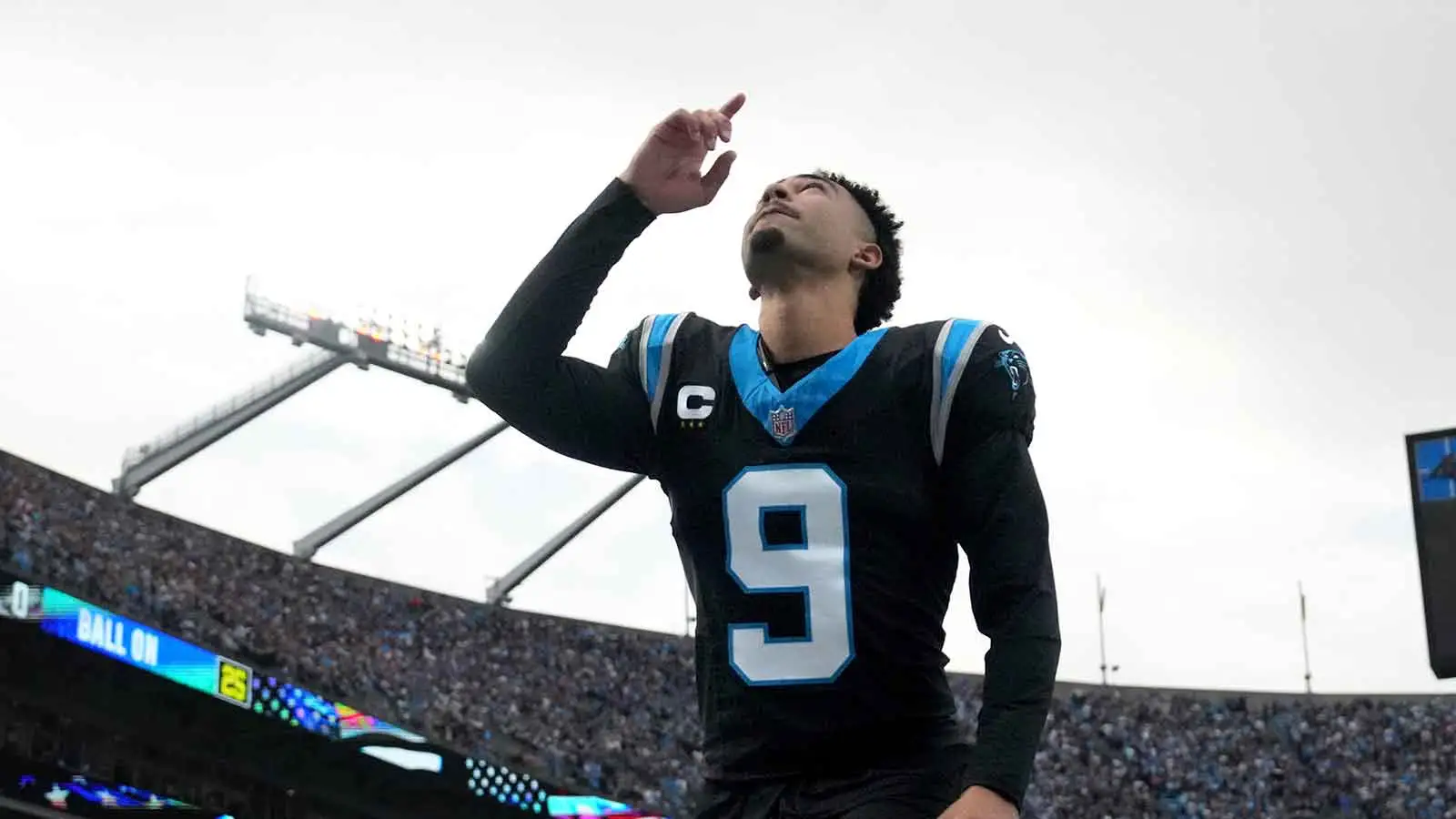 Jan 10, 2026; Charlotte, NC, USA; Carolina Panthers quarterback Bryce Young (9) reflects before an NFC Wild Card Round game at Bank of America Stadium. Mandator…