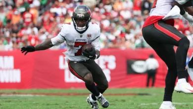 Sep 28, 2025; Tampa, Florida, USA; Tampa Bay Buccaneers running back Bucky Irving (7) runs the ball during the first quarter against the Philadelphia Eagles at…