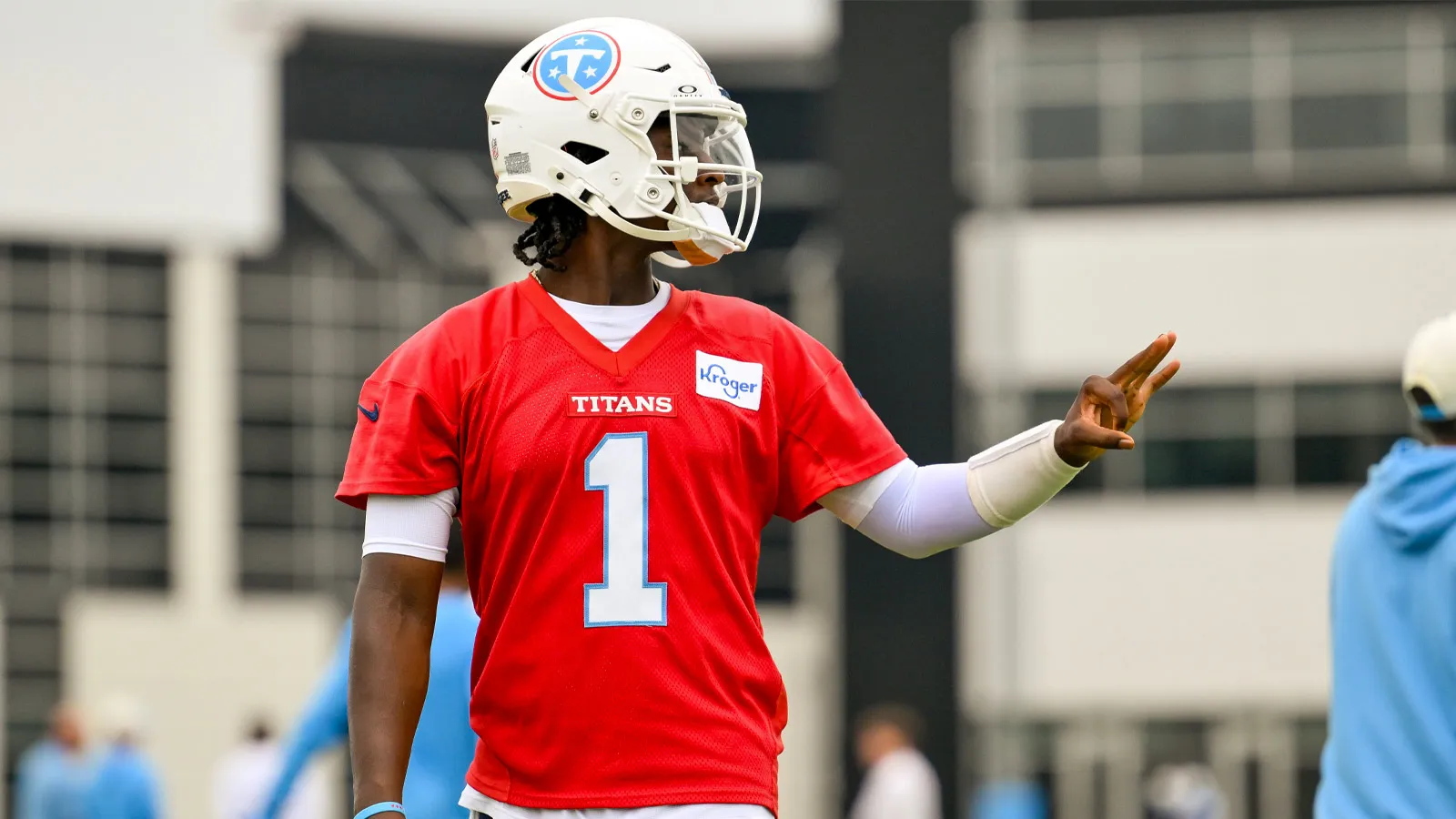 Aug 1, 2026; Nashville, TN, USA; Tennessee Titans quarterback Cam Ward (1) gestures to the receiver during training camp at Vanderbilt Health Football Center. M…