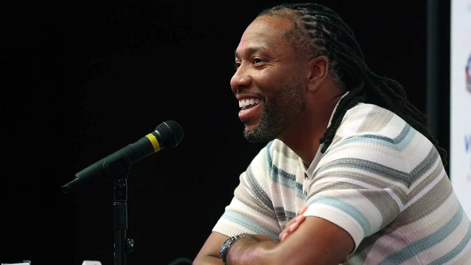 Aug 6, 2026; Canton, Ohio, USA; 2026 Professional Football Hall of Fame enshrinee former Arizona Cardinals receiver Larry Fitzgerald speaks at a press conferenc…