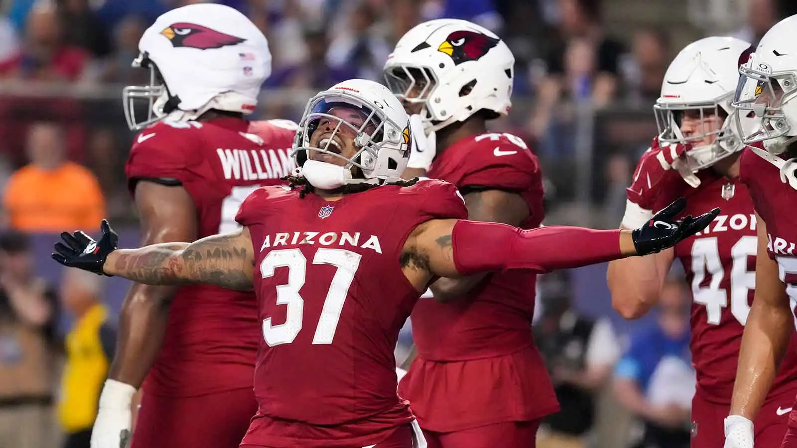Aug 6, 2026; Canton, Ohio, USA; Arizona Cardinals running back Corey Kiner (37) reacts during the game against the Carolina Panthers at Tom Benson Hall of Fame…