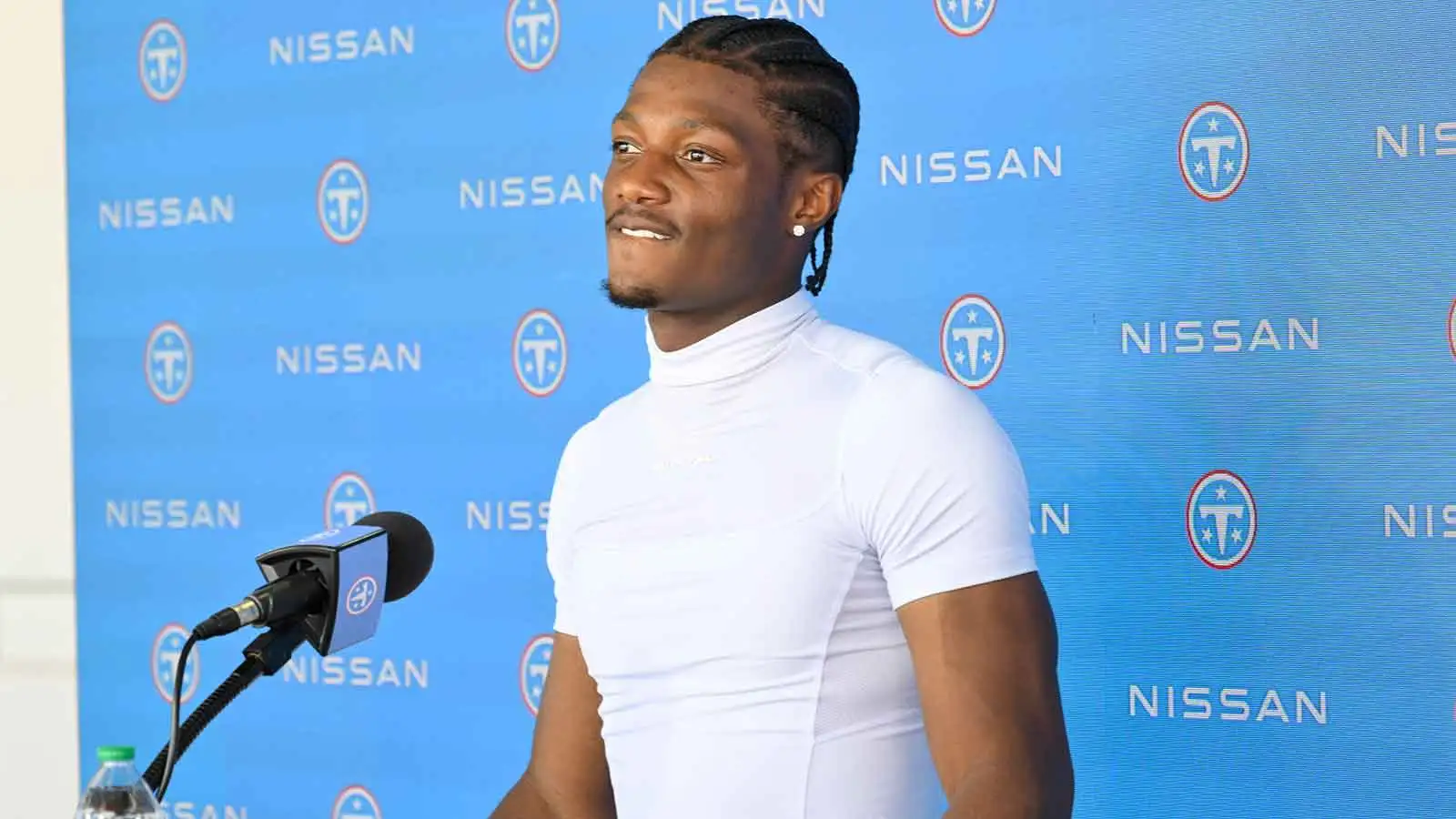 Jun 16, 2026; Nashville, TN, USA; Tennessee Titans wider receiver Carnell Tate (14) talks with the media post practice during day 1 of mini-camp at Vanderbilt H…