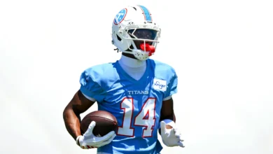 Jun 16, 2026; Nashville, TN, USA; Tennessee Titans wider receiver Carnell Tate (14) runs with the ball after a made catch during day 1 of mini-camp at Vanderbil…