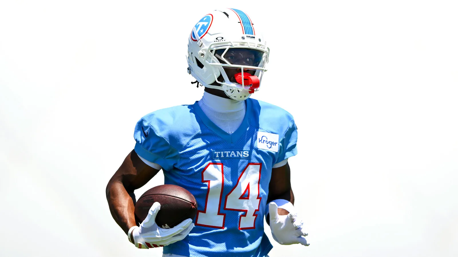 Jun 16, 2026; Nashville, TN, USA; Tennessee Titans wider receiver Carnell Tate (14) runs with the ball after a made catch during day 1 of mini-camp at Vanderbil…