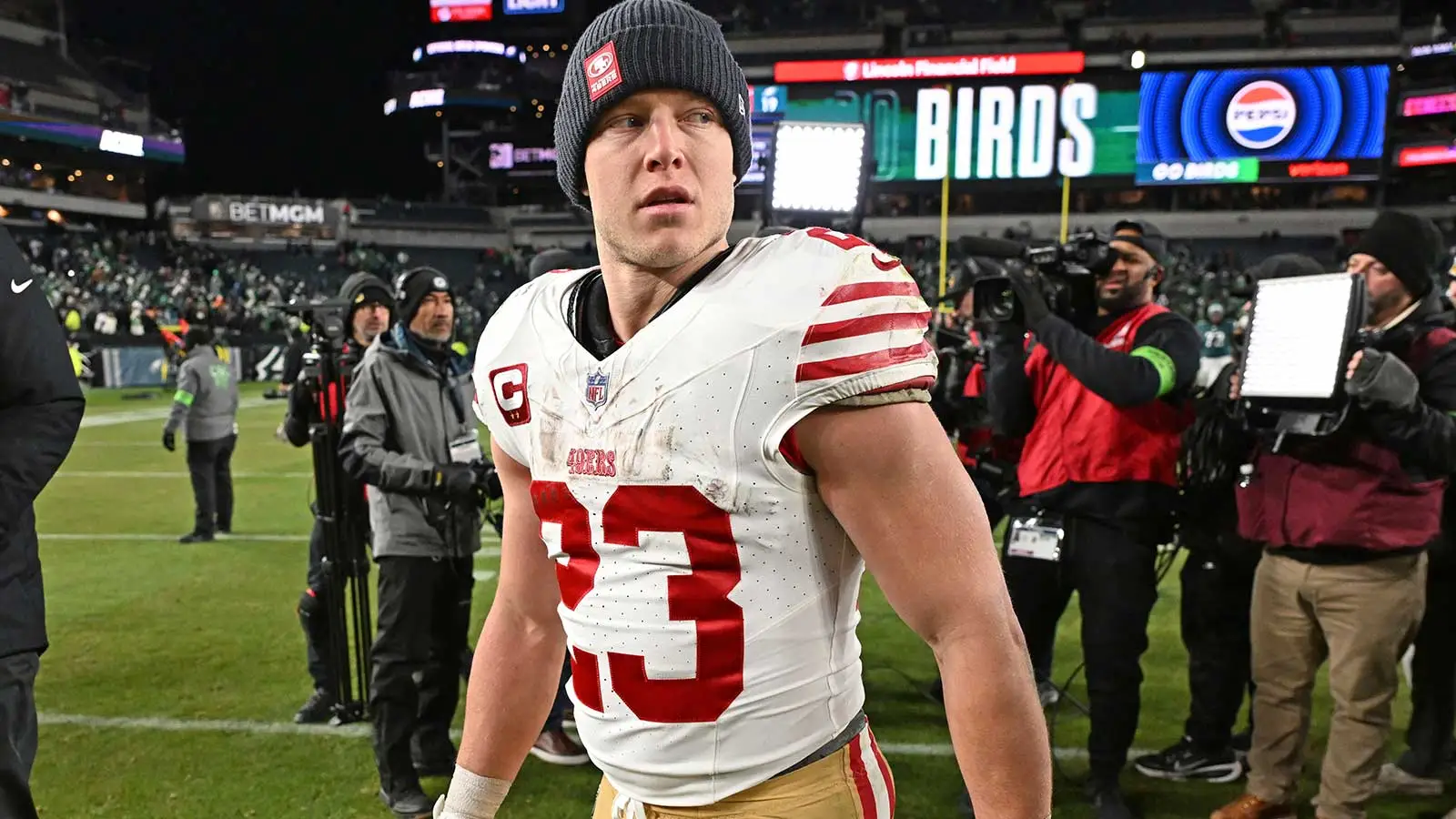Jan 11, 2026; Philadelphia, PA, USA; San Francisco 49ers running back Christian McCaffrey (23) on the field after win against the Philadelphia Eagles in an NFC…