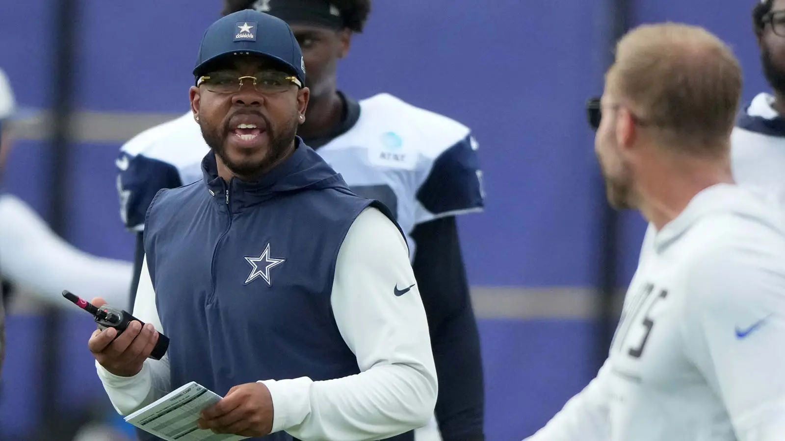 Aug 11, 2026; Woodland Hills, CA, USA; Dallas Cowboys defensive coordinator Christian Parker (left) and Los Angeles Rams head coach Sean McVay react during a jo…