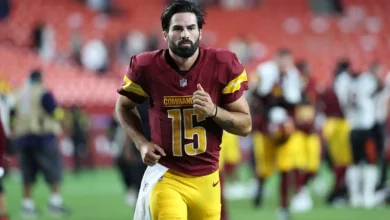 Aug 18, 2025; Landover, Maryland, USA; Washington Commanders quarterback Sam Hartman (15) runs off the field after the game against the Cincinnati Bengals at No…
