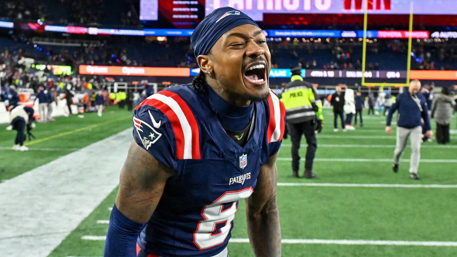 Jan 11, 2026; Foxborough, MA, USA; New England Patriots wide receiver Stefon Diggs (8) reacts after defeating the Los Angeles Chargers in an AFC Wild Card Round…