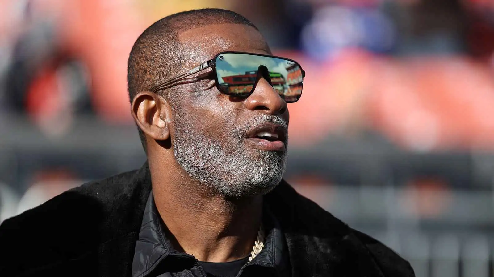 Dec 21, 2025; Cleveland, Ohio, USA; Legendary football and baseball player and father of Cleveland Browns quarterback Shedeur Sanders, Deion Sanders on the side…