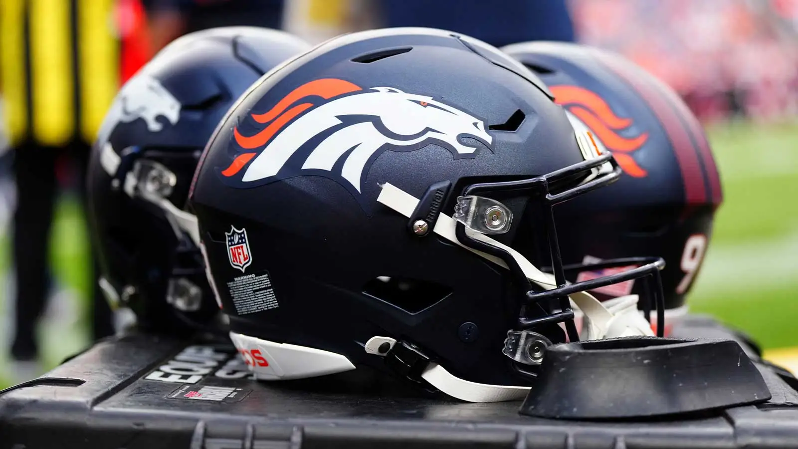 Aug 25, 2024; Denver, Colorado, USA; Detail view of the helmets worn by the Denver Broncos during the second half against the Arizona Cardinals t Empower Field…