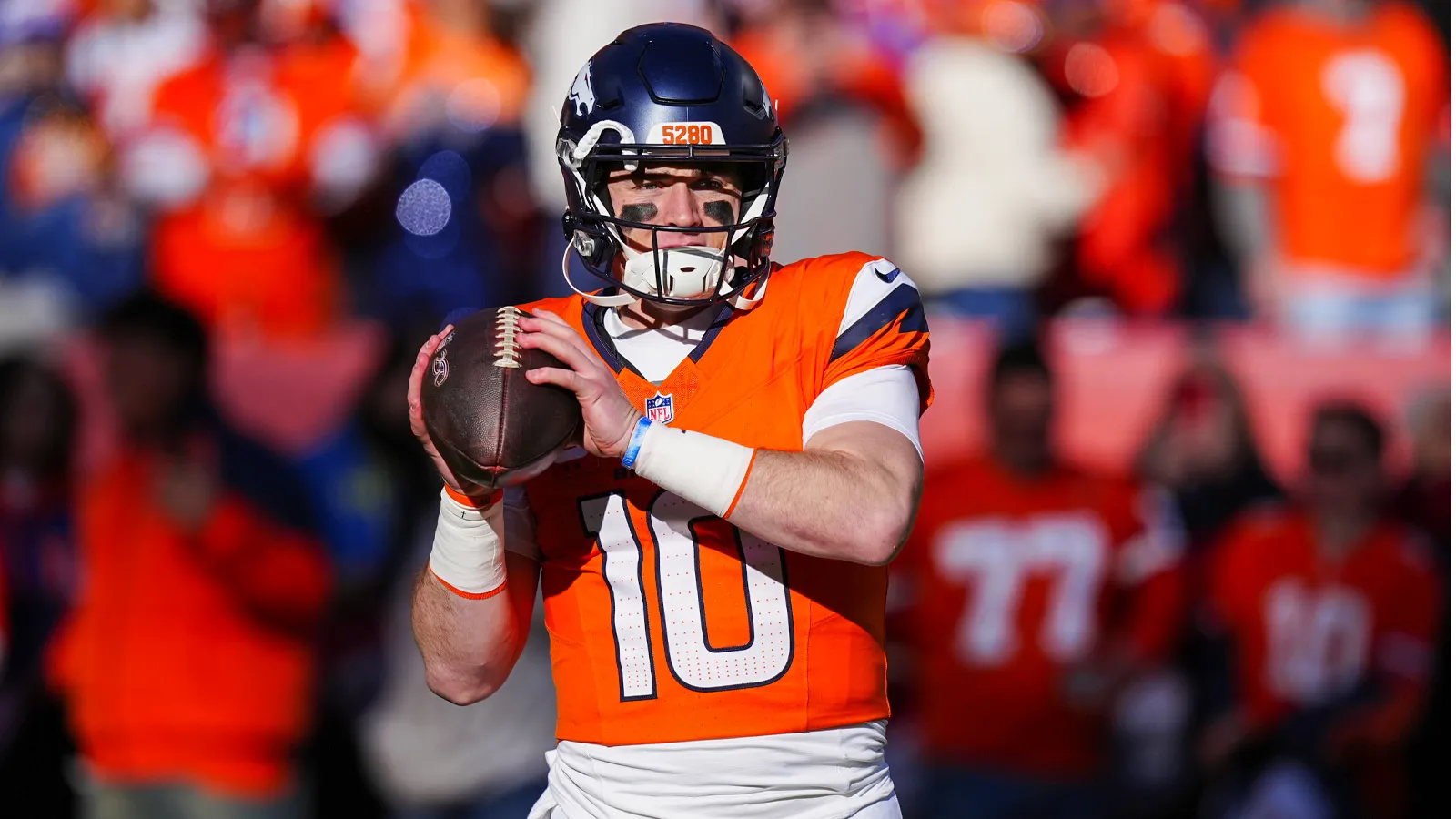 Jan 17, 2026; Denver, CO, USA; Denver Broncos quarterback Bo Nix (10) warms up before an AFC Divisional Round playoff game against the Buffalo Bills at Empower…