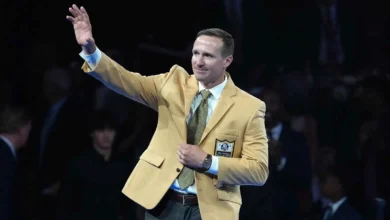 Drew Brees reacts during the Pro Football Hall of Fame Gold Jacket dinner at Canton Memorial Civic Center and Cultural Center. Mandatory Credit: Kirby Lee-Imagn…