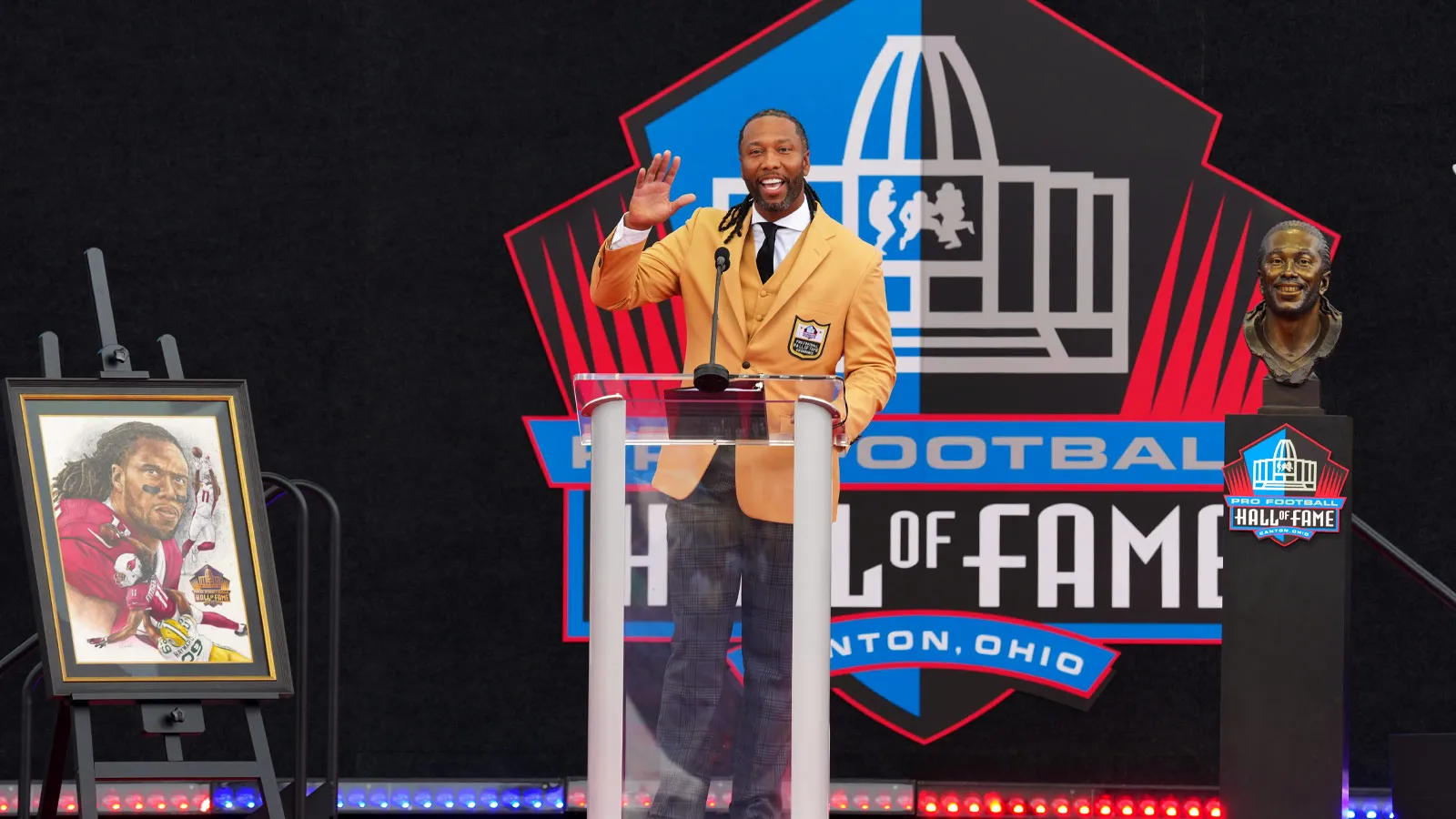 Aug 8, 2026; Canton, OH, USA; Larry Fitzgerald speaks during the Pro Football Hall of Fame enshrinement at Tom Benson Hall of Fame Stadium. Mandatory Credit: Ki…