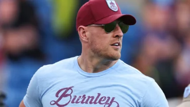 J.J. Watt gestures prior to the Premier League match between Burnley FC and Manchester City at Turf Moor