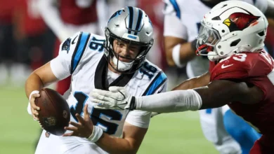Aug 6, 2026; Canton, Ohio, USA; Carolina Panthers quarterback Haynes King (16) runs the ball against Arizona Cardinals linebacker Austin Keys (53) at Tom Benson…