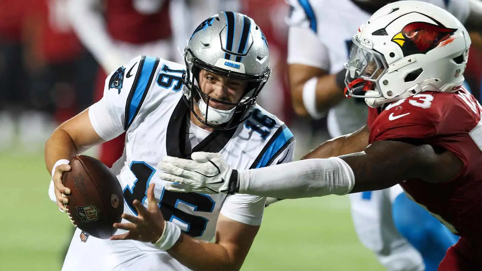 Aug 6, 2026; Canton, Ohio, USA; Carolina Panthers quarterback Haynes King (16) runs the ball against Arizona Cardinals linebacker Austin Keys (53) at Tom Benson…