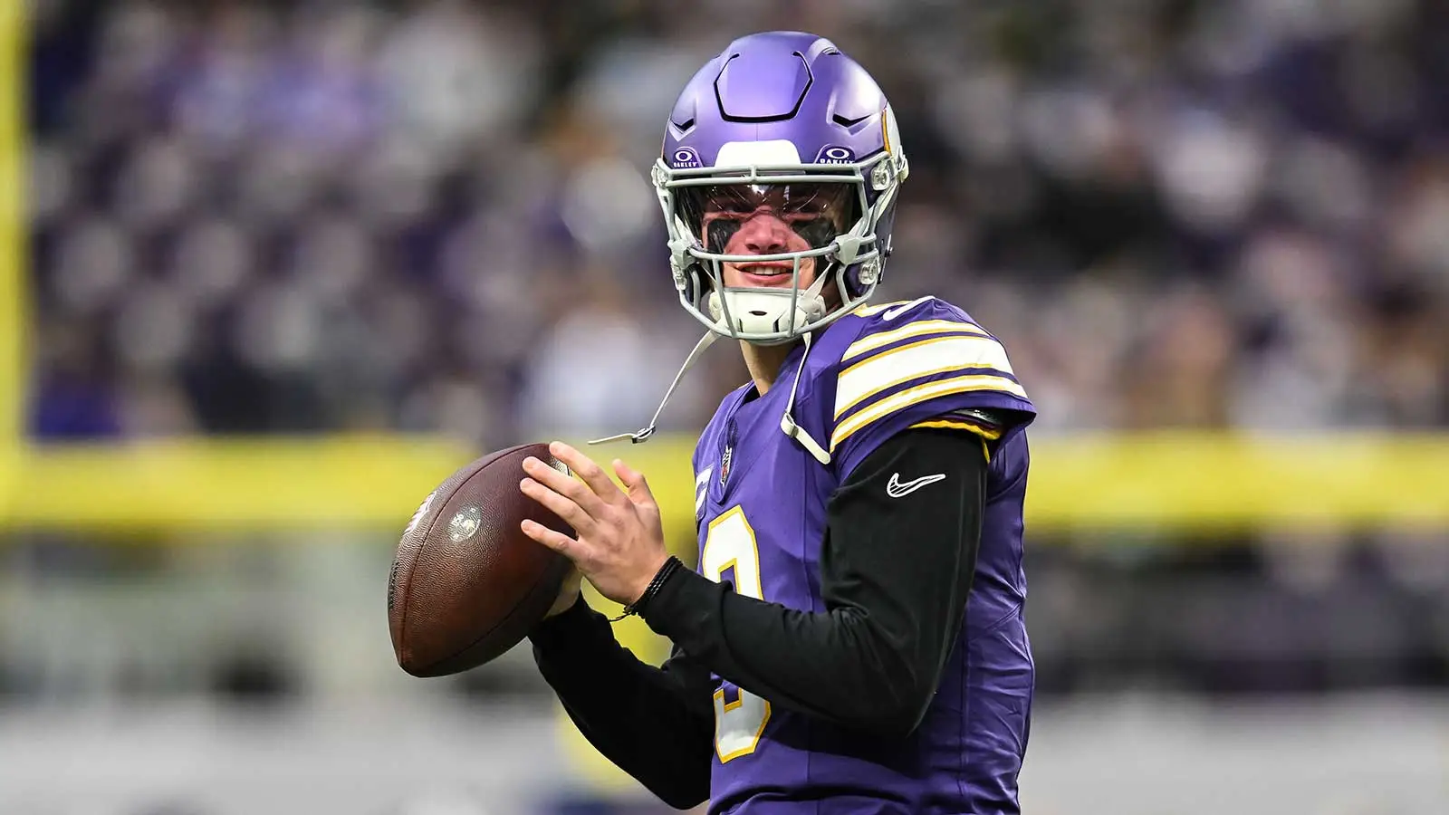 Jan 4, 2026; Minneapolis, Minnesota, USA; Minnesota Vikings quarterback J.J. McCarthy (9) warms up before the game against the Green Bay Packers at U.S. Bank St…