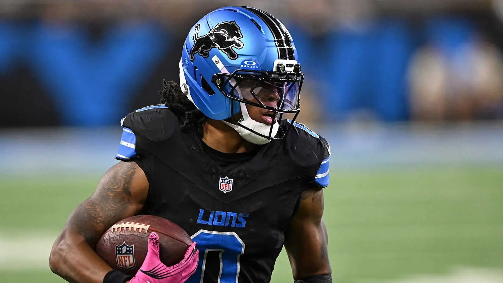 Oct 20, 2025; Detroit, Michigan, USA; Detroit Lions running back Jahmyr Gibbs (0) rushes the ball against the Tampa Bay Buccaneers during the first half at Ford…