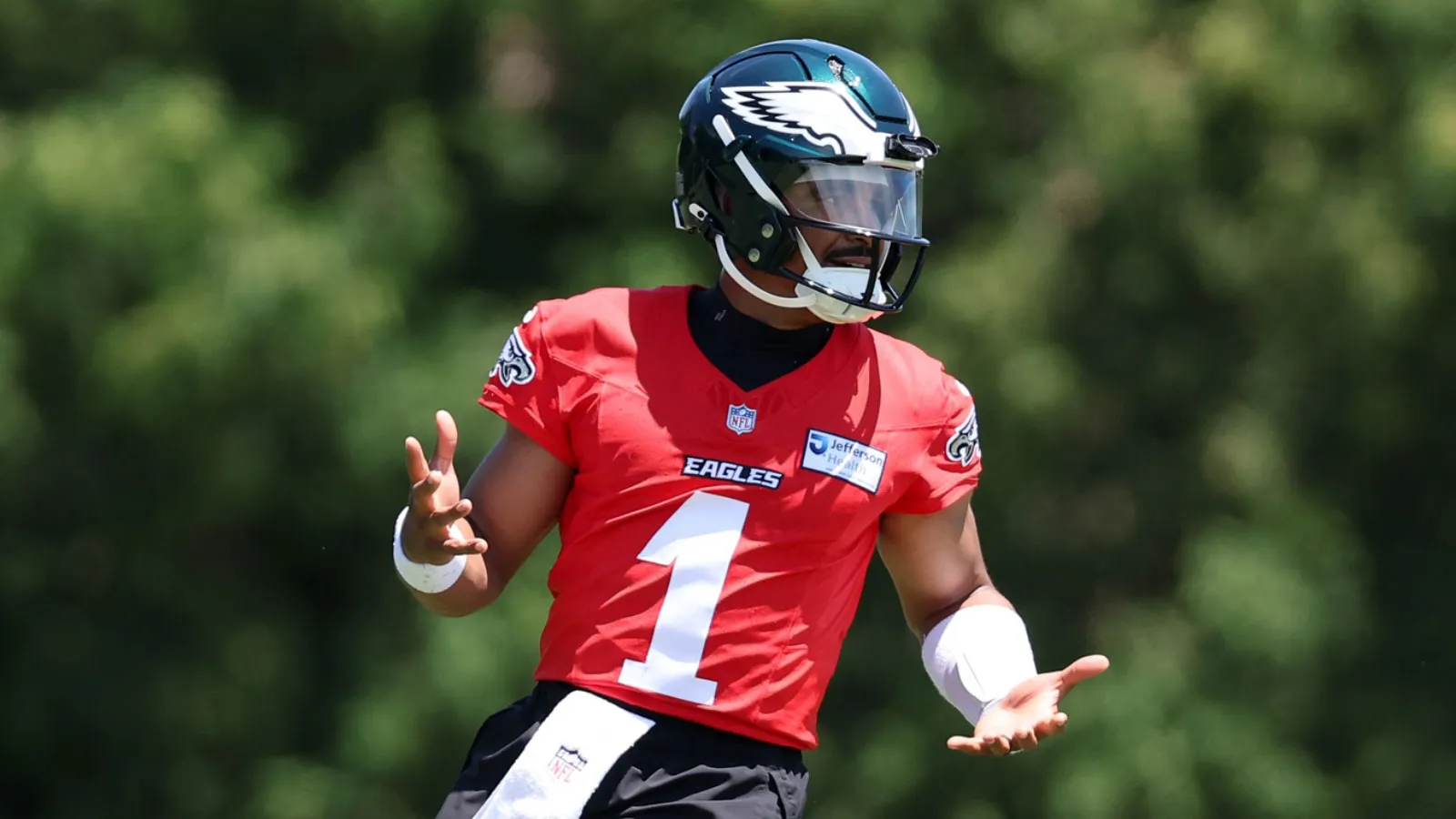 Jun 9, 2026; Philadelphia, PA, USA; Philadelphia Eagles quarterback Jalen Hurts (1) reacts to a drill during minicamp at Jefferson Health Training Complex. Mand…
