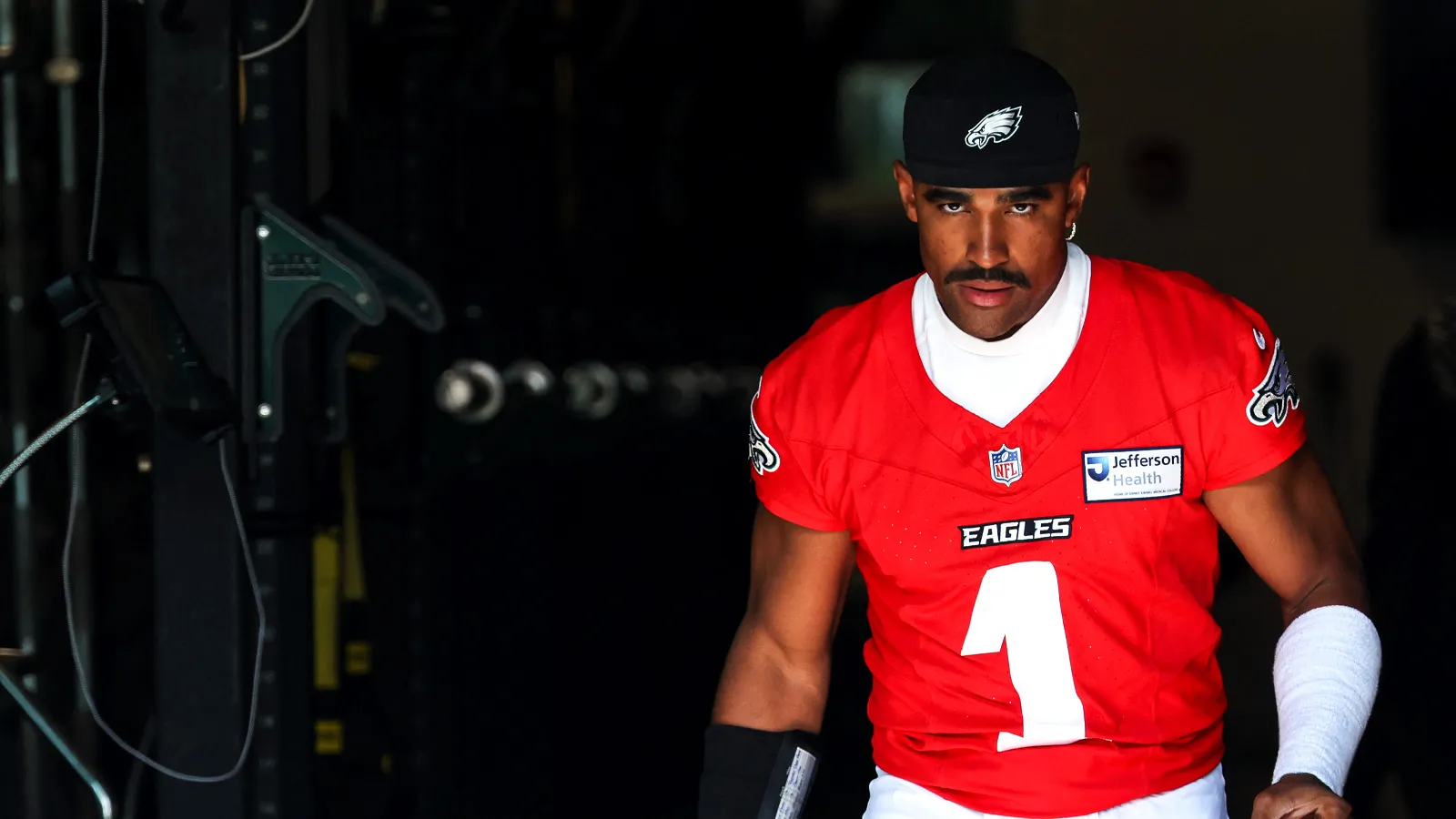 Jul 29, 2026; Philadelphia, PA, USA; Philadelphia Eagles quarterback Jalen Hurts (1) walks out of a weight room for the start of training camp at Jefferson Heal…