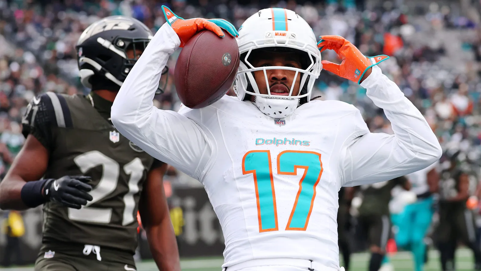Dec 7, 2025; East Rutherford, New Jersey, USA; Miami Dolphins wide receiver Jaylen Waddle (17) reacts after making a catch for a touchdown against the New York…