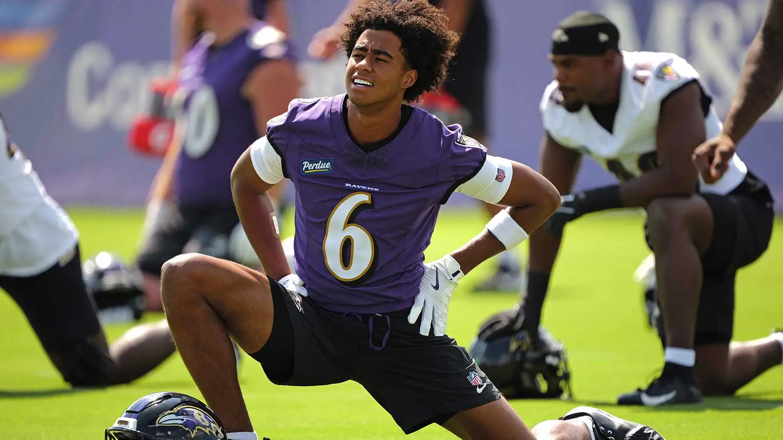 Jul 29, 2026; Ownings Mills, MD, USA; Baltimore Ravens wide receiver Ja’Kobi Lane (6) stretches during practice at the Under Armour Performance Center. Mandator…