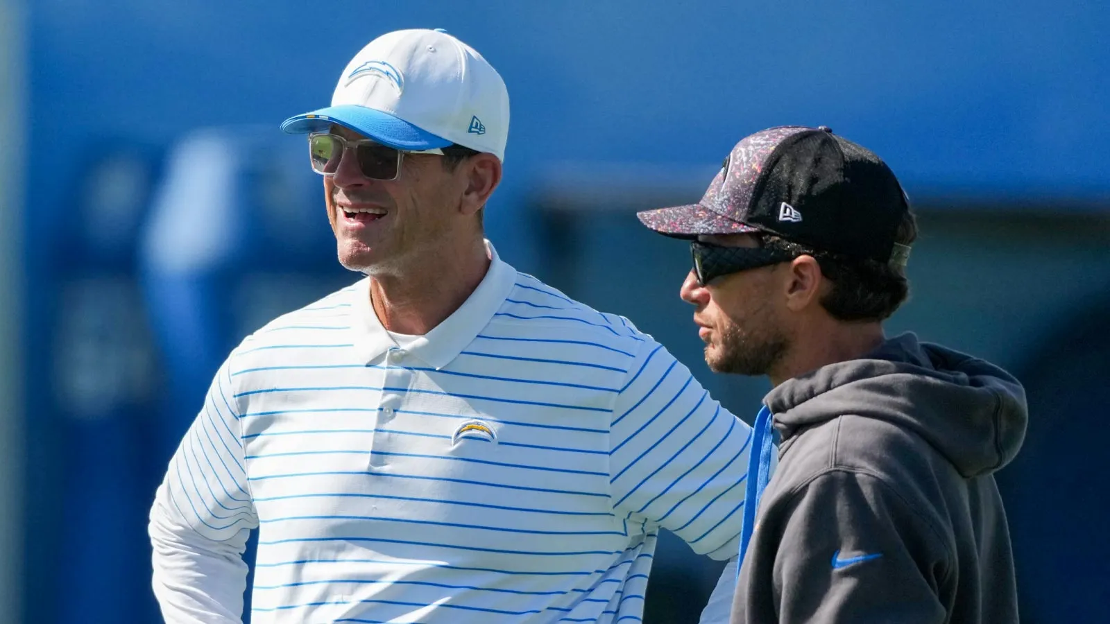 Jul 31, 2026; El Segundo, CA, USA; Los Angeles Chargers coach Jim Harbaugh (left) and offensive coordinator Mike McDaniel during training camp at The Bolt. Mand…