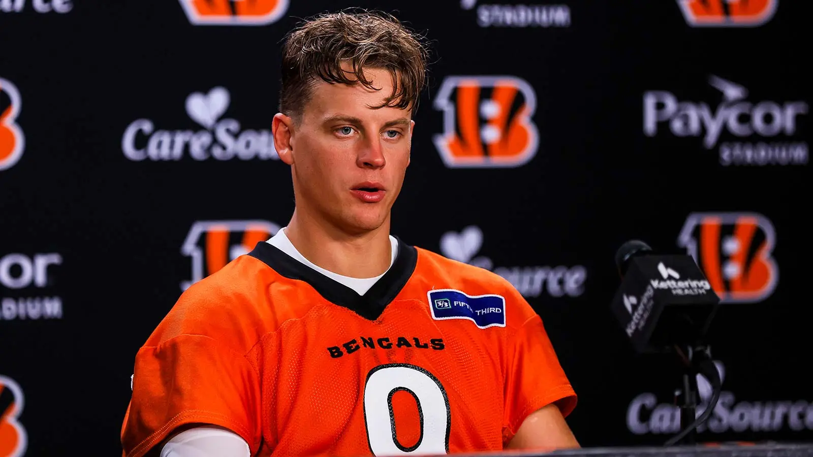 Jul 29, 2026; Cincinnati, OH, USA; Cincinnati Bengals quarterback Joe Burrow (9) talks during a press conference at the end of training camp at Kettering Health…