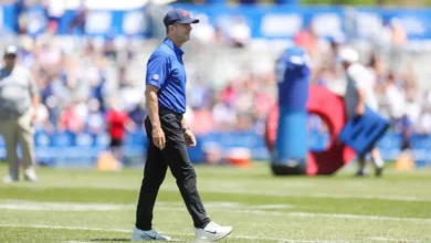 Jul 30, 2026; White Sulphur Springs, WV, USA; New York Giants head coach John Harbaugh walks the field during training camp at The Greenbrier Resort Sports Perf…