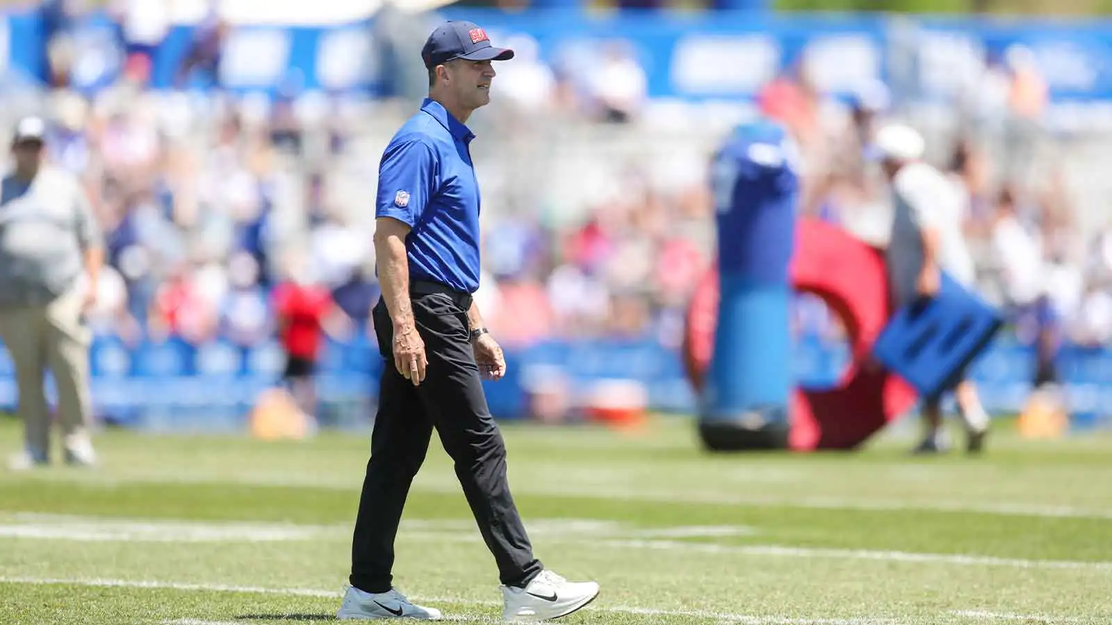Jul 30, 2026; White Sulphur Springs, WV, USA; New York Giants head coach John Harbaugh walks the field during training camp at The Greenbrier Resort Sports Perf…