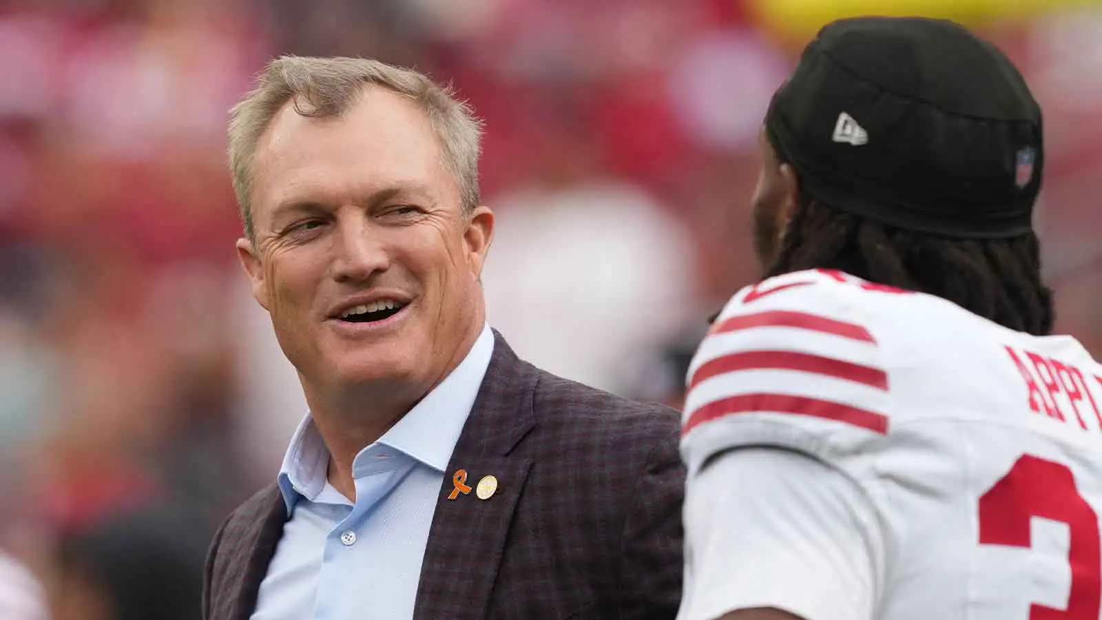 San Francisco 49ers general manager John Lynch (left) talks with cornerback Eli Apple (right) before the game against the Jacksonville Jaguars at Levi's Stadium…