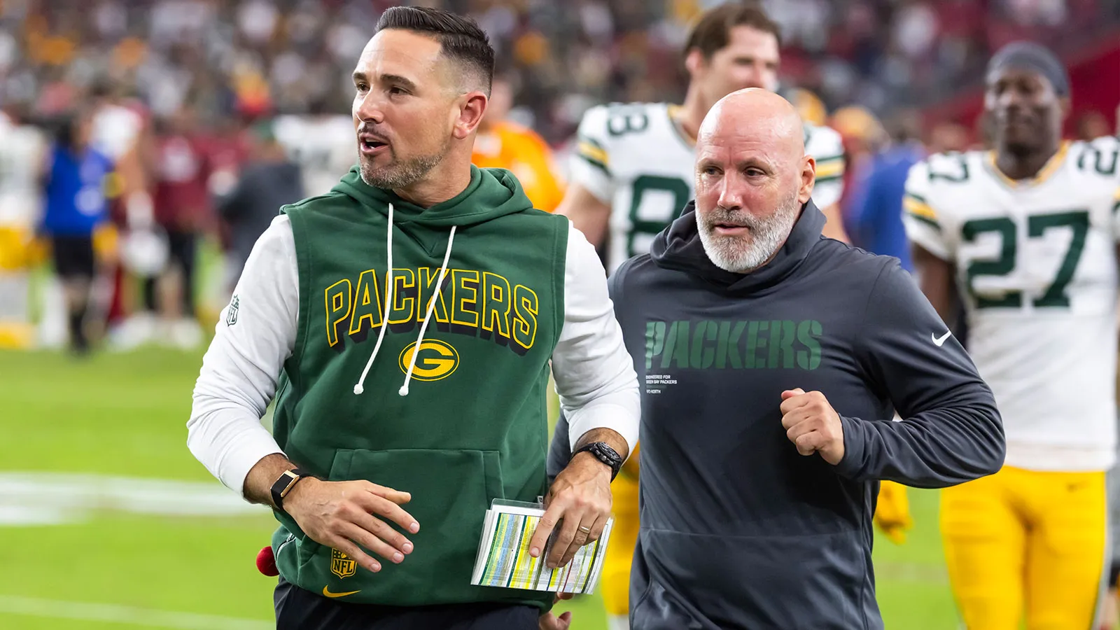 Oct 19, 2025; Glendale, Arizona, USA; Green Bay Packers head coach Matt LaFleur (left) with vice president of security Doug Collins following the game against t…