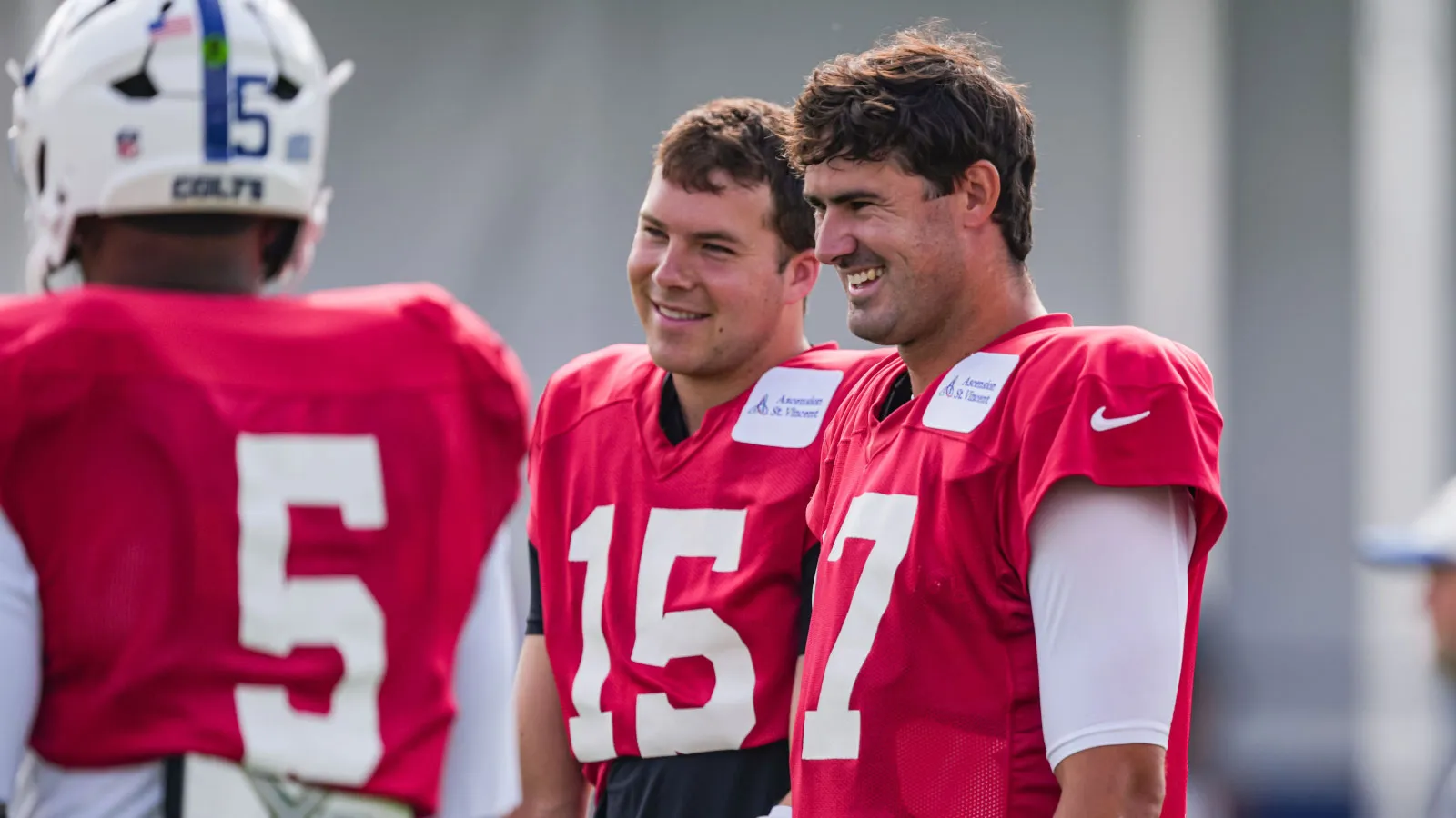 Indianapolis Colts quarterback Daniel Jones (17) laughs while talking to teammates on Monday, Aug. 3, 2026, during practice at Colts Camp at Grand Park in Westf…