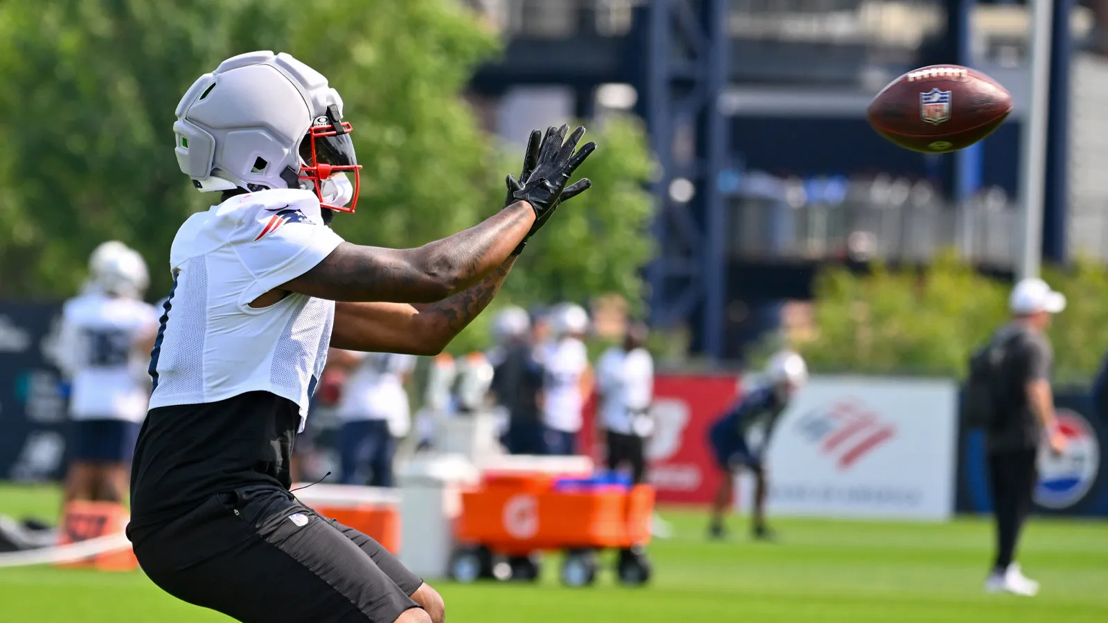 Jul 28, 2026; Foxborough, MA, USA; New England Patriots wide receiver Kayshon Boutte (9) makes a catch during training camp at Gillette Stadium. Mandatory Credi…