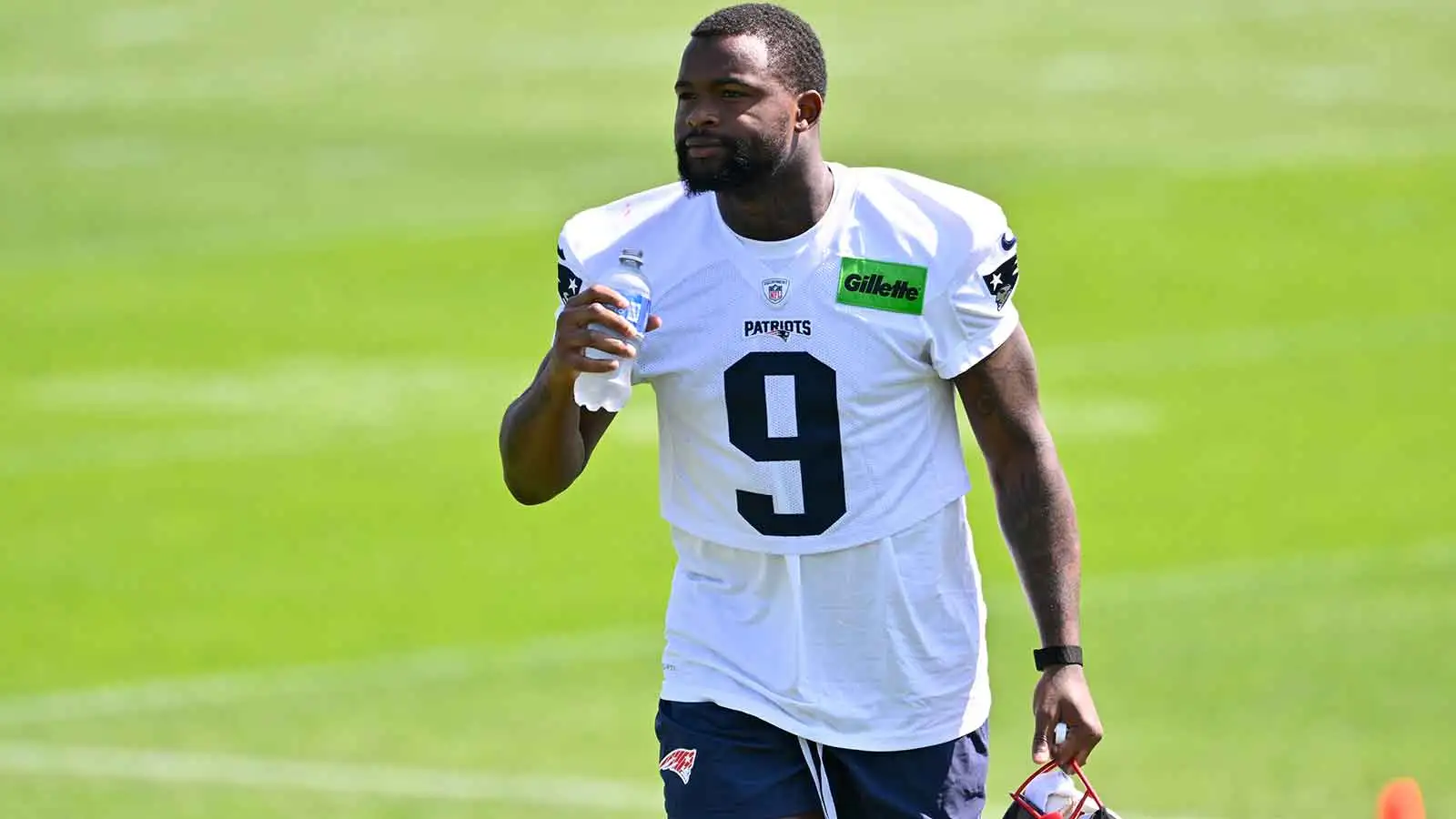 Jul 25, 2026; Foxborough, MA, USA; New England Patriots wide receiver Kayshon Boutte (9) walks to the practice field at training camp at Gillette Stadium. Manda…