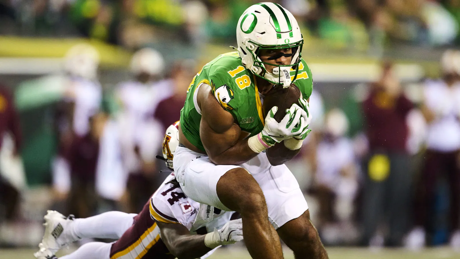 Nov 14, 2025; Eugene, Oregon, USA; Oregon Ducks tight end Kenyon Sadiq (18) catches a pass during the first half against Minnesota Golden Gophers defensive back…