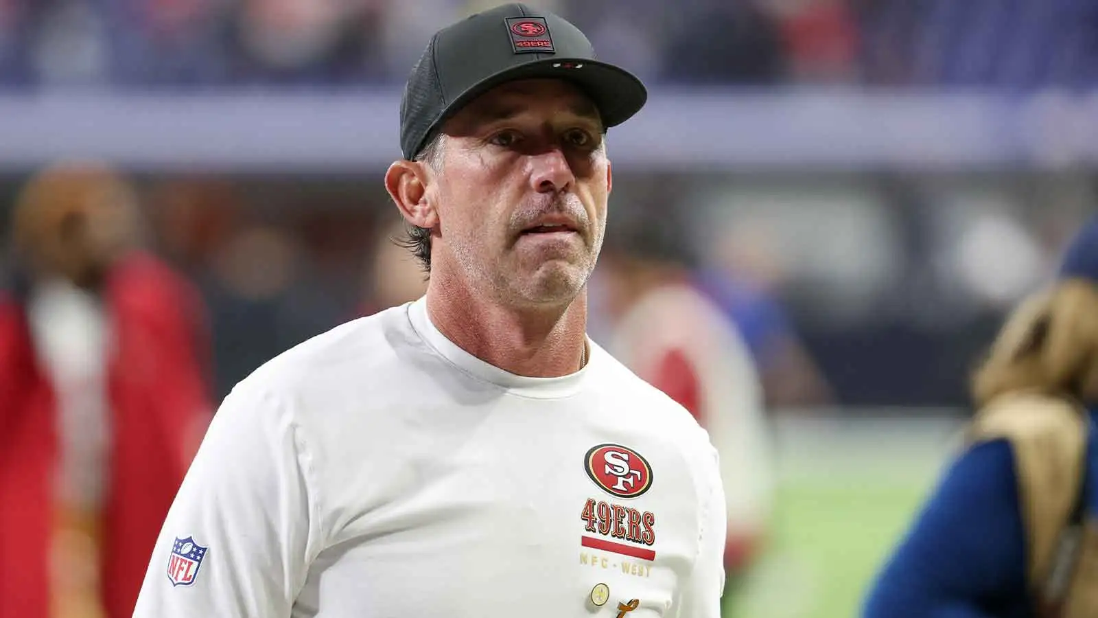 Dec 22, 2025; Indianapolis, Indiana, USA; San Francisco 49ers head coach Kyle Shanahan leaves the field after the game against the Indianapolis Colts at Lucas O…